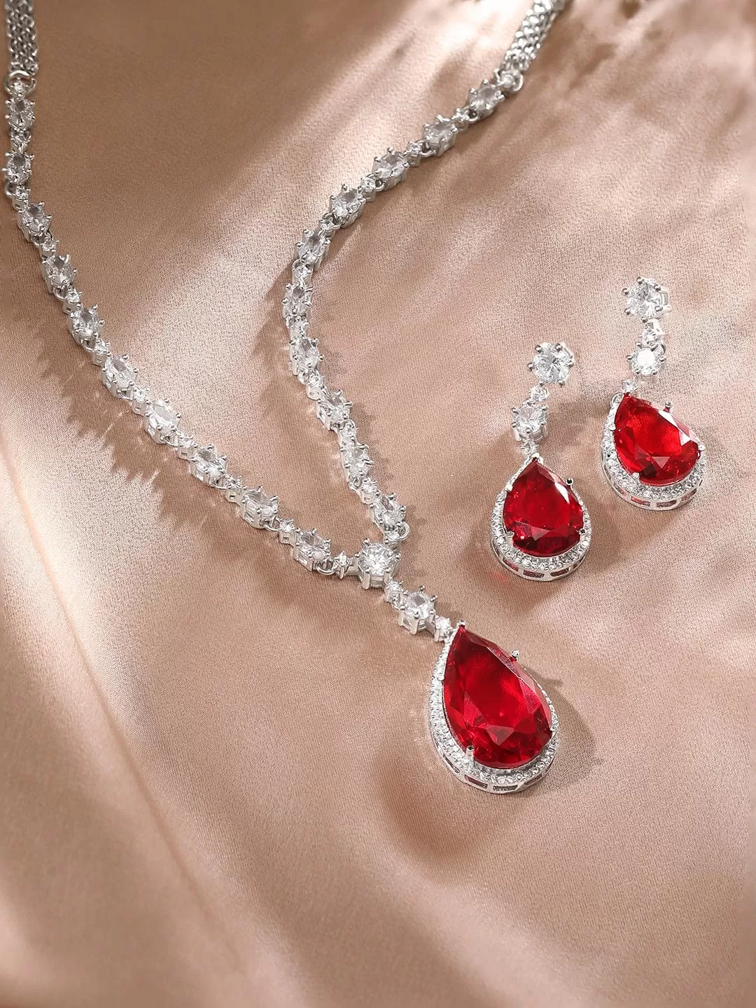 Rubans High Rhodium Finish, Premium White & Red Zircons Studded Party Wear Jewellery Set.